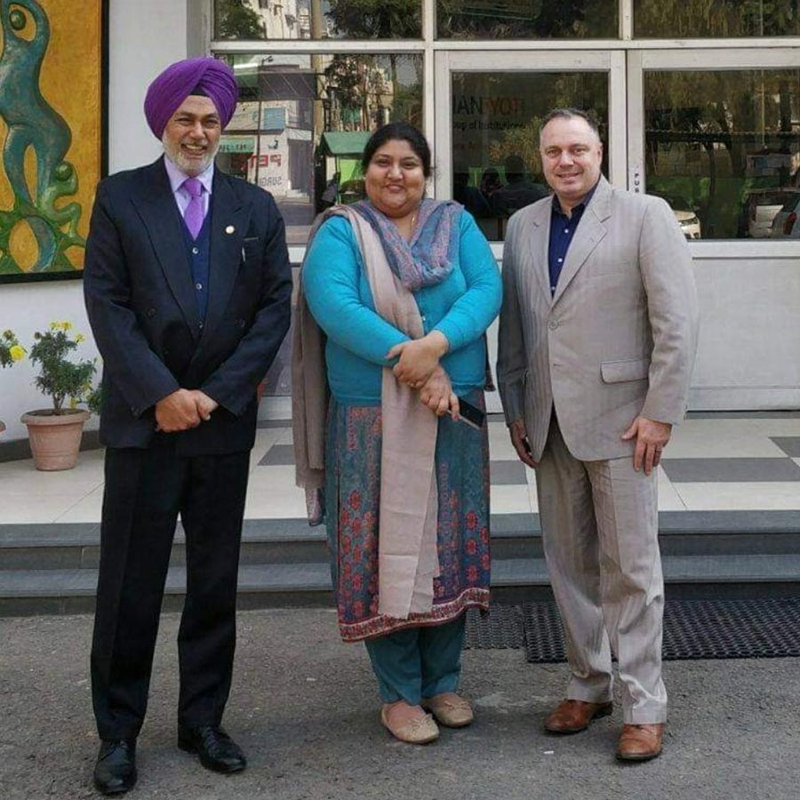 Gurdeepak Singh and Corey Sigvaldason with the University Director in Chandigarh, India